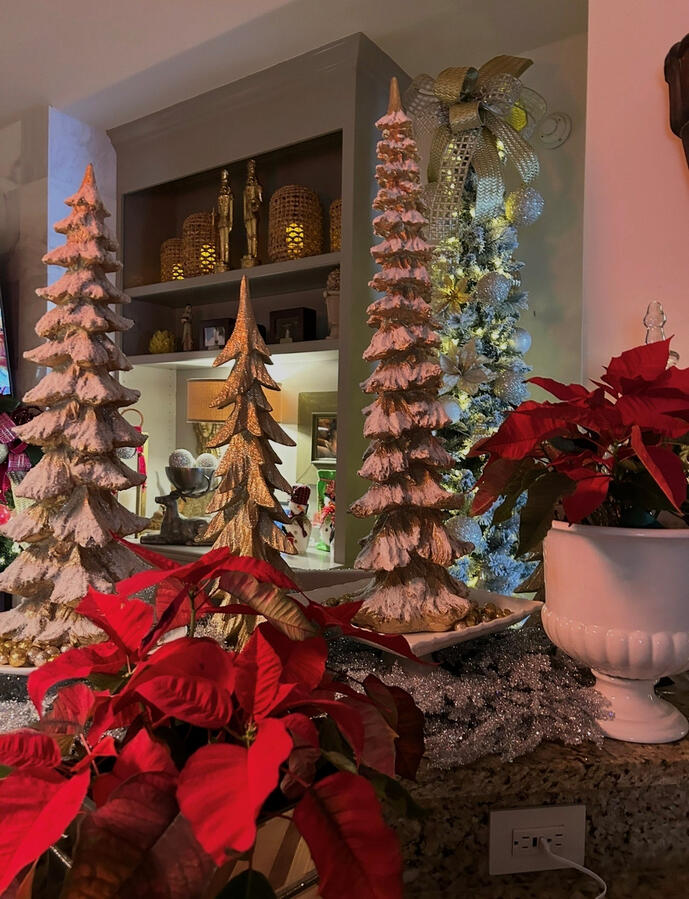 Colorful touches of red with a sprinkling of miniature trees to create that festive feel.
